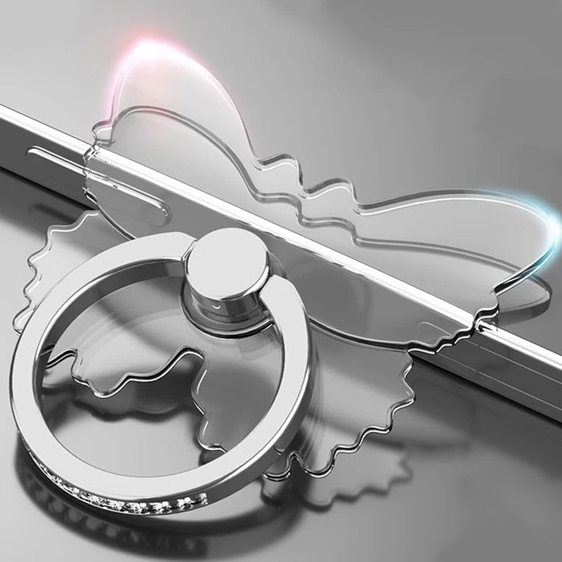 Butterfly-shaped phone ring holder with LED light on a gray background