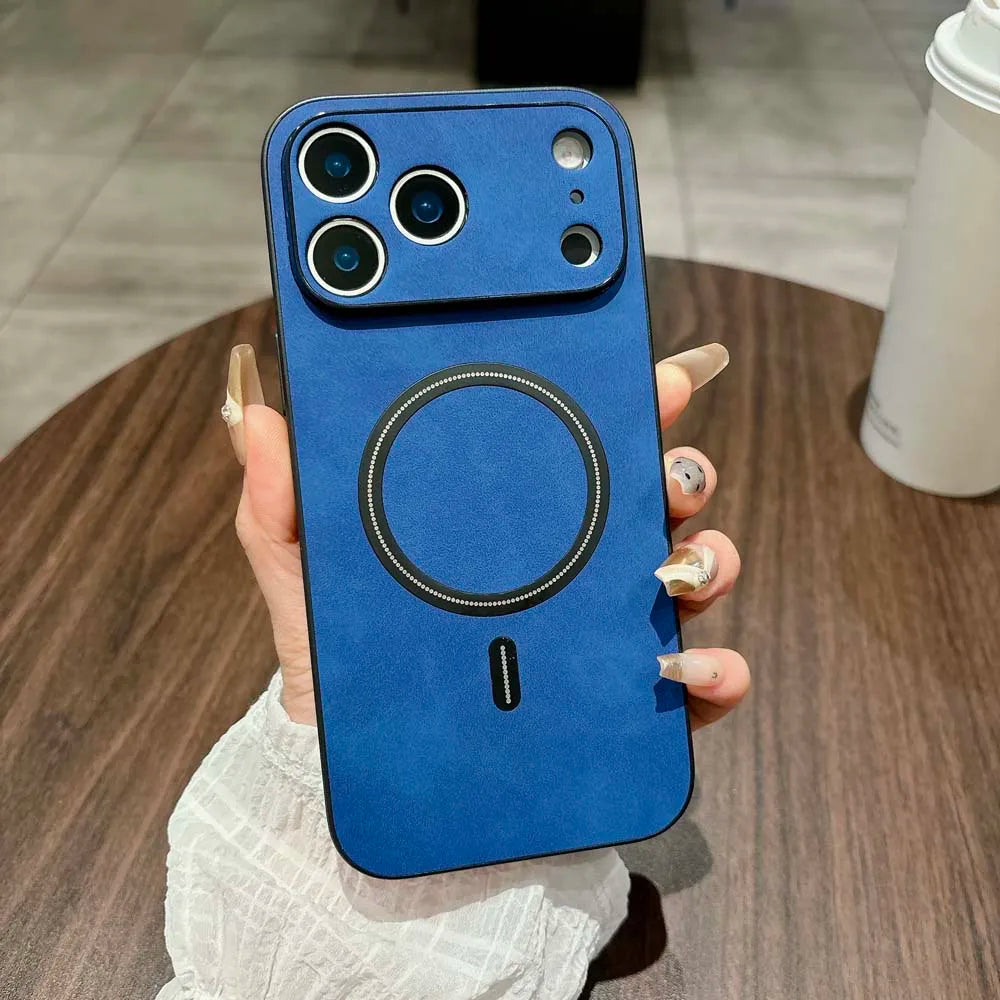 Blue phone case held by a hand on a wooden surface with a blurred background