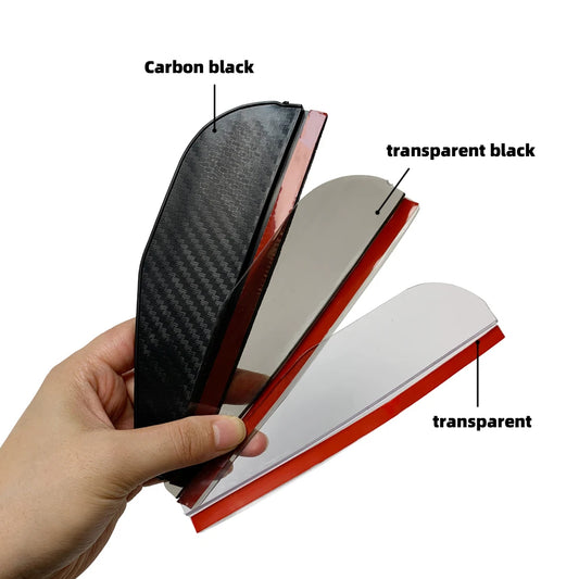 Hand holding three carbon fiber panels labeled 'carbon black', 'transparent black', and 'transparent' against a white background.