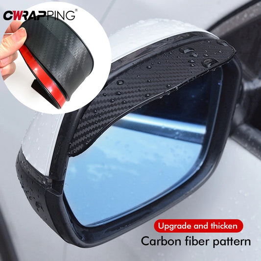 Car mirror with carbon fiber pattern cover and hand holding tool inset.
