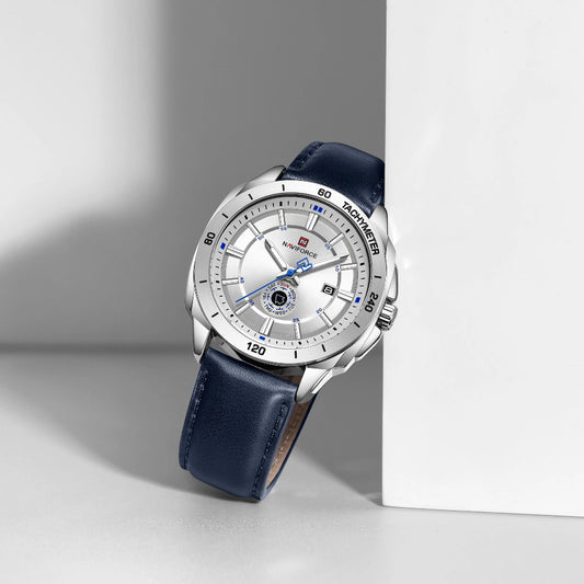 Wristwatch with blue strap and silver case on a light gray background