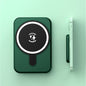 Green phone case with a black circular design on a light green background