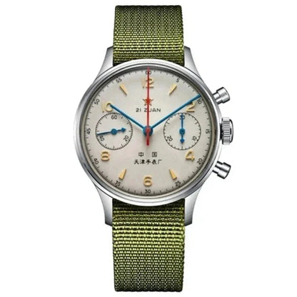 Watch with green strap and white face on a white background